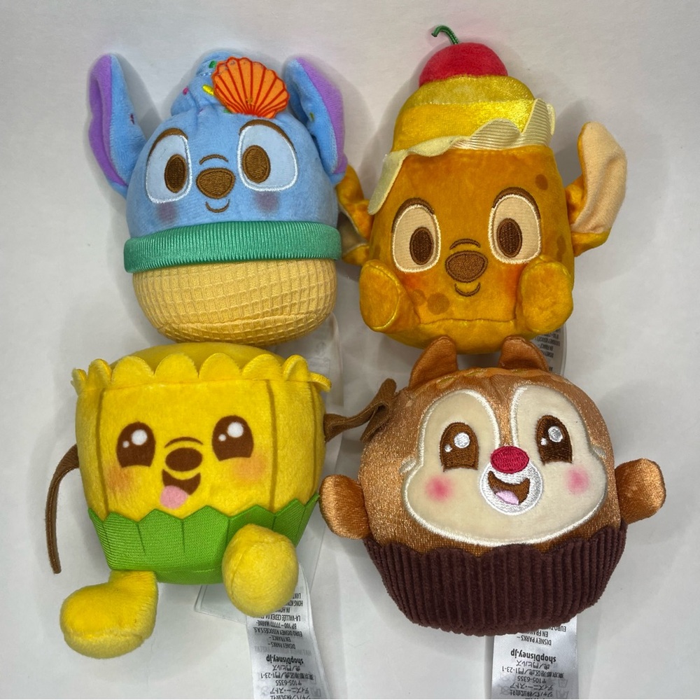 Disney Munchlings Lot of 4 - Aulani Pineapple Cake Stitch Chocolate Pluto Dale